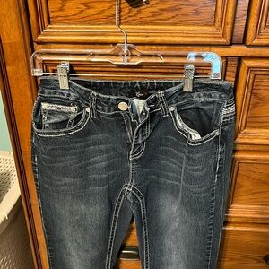 Women’s Love Indigo jeans. Waist 15”, inseam 29”.